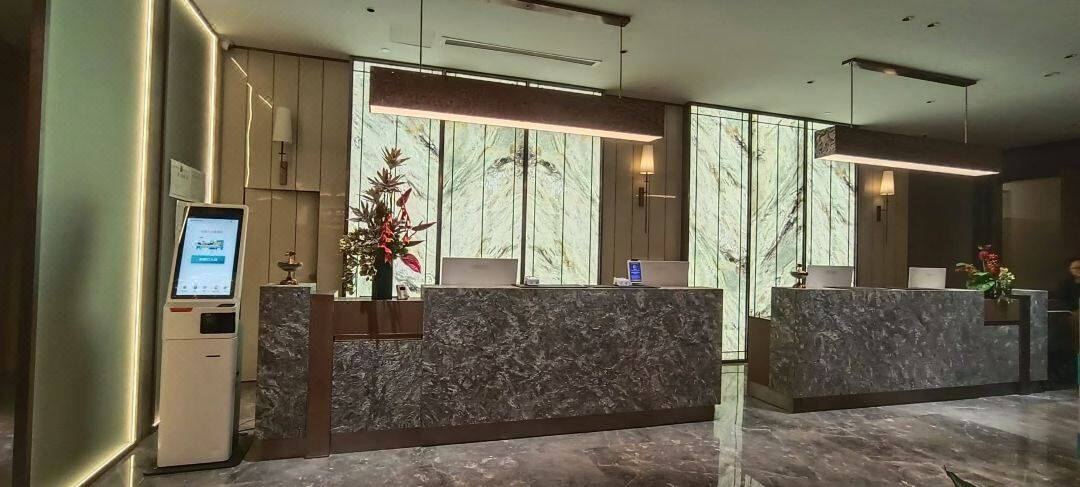 Aifeikedun Hotel front desk